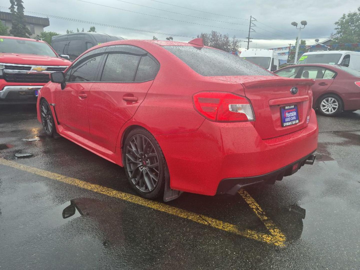 2021 RED SUBARU WRX PREMIUM (JF1VA1C64M9) with an 2.0L engine, Continuously Variable transmission, located at 929 East 8th Ave, Anchorage, AK, 99501, (907) 274-2277, 61.214783, -149.866074- Photo#2