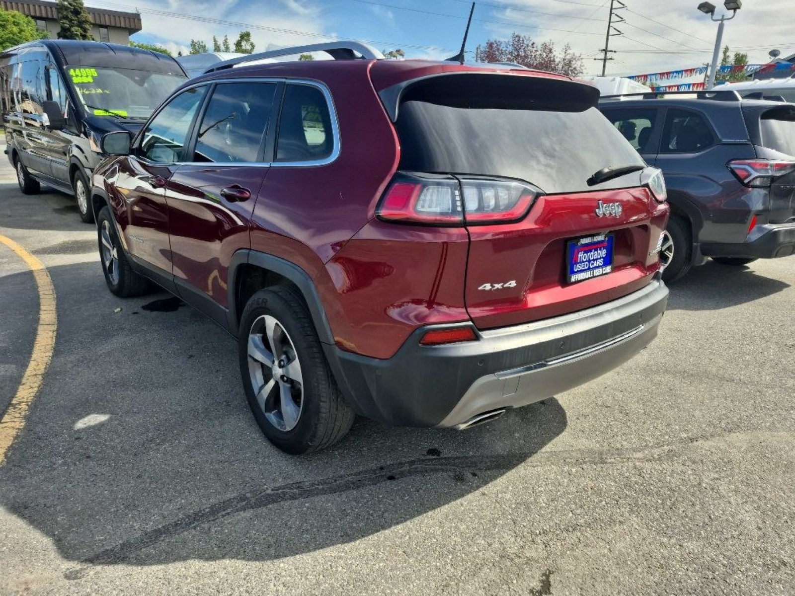 2019 RED JEEP CHEROKEE LIMITED (1C4PJMDN3KD) with an 2.0L engine, Automatic transmission, located at 929 East 8th Ave, Anchorage, AK, 99501, (907) 274-2277, 61.214783, -149.866074 - Photo#2