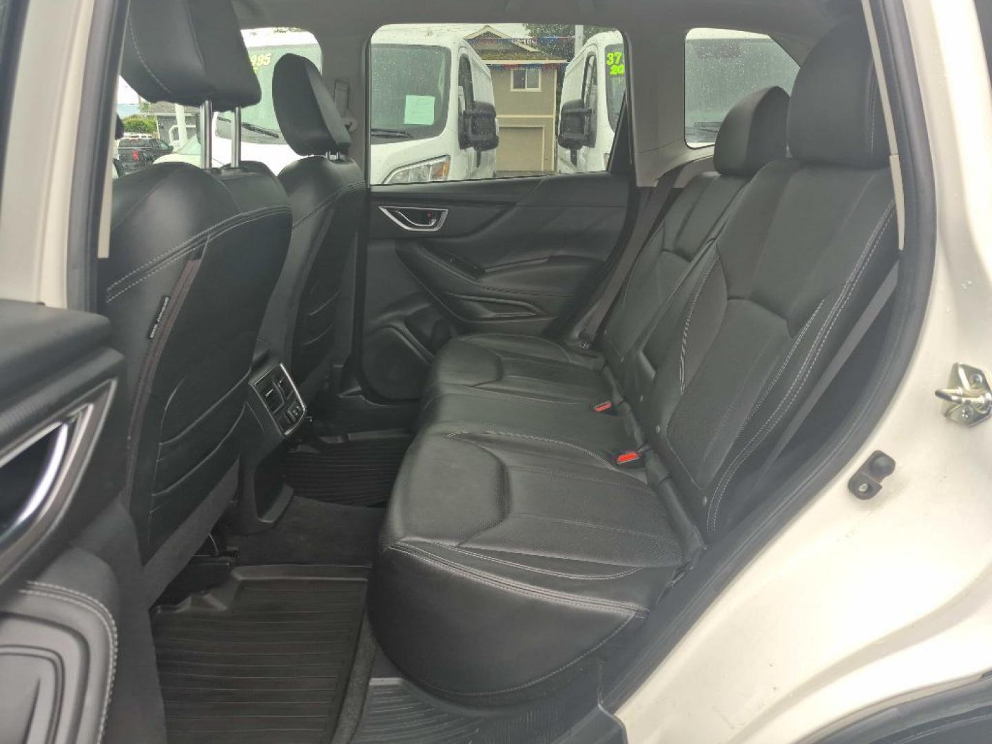 2019 WHITE SUBARU FORESTER LIMITED (JF2SKAUC8KH) with an 2.5L engine, Continuously Variable transmission, located at 929 East 8th Ave, Anchorage, AK, 99501, (907) 274-2277, 61.214783, -149.866074- Photo#3