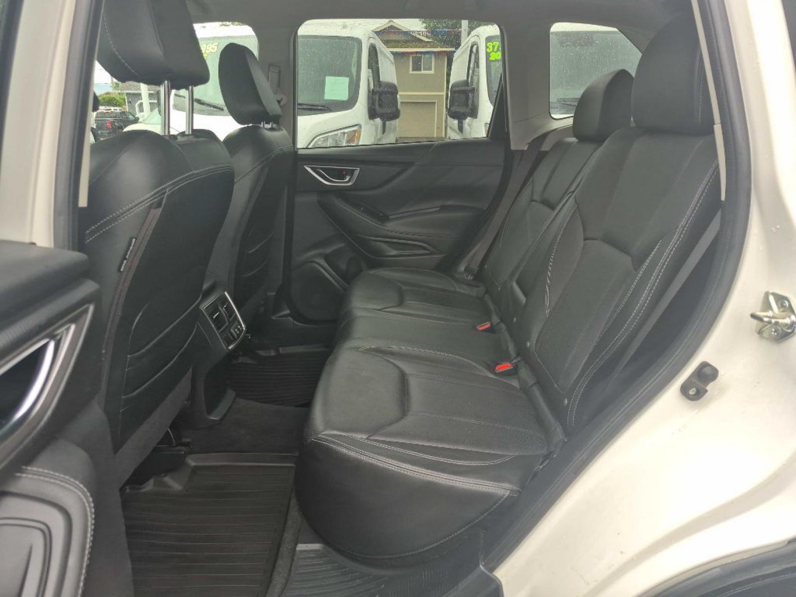 2019 WHITE SUBARU FORESTER LIMITED (JF2SKAUC8KH) with an 2.5L engine, Continuously Variable transmission, located at 929 East 8th Ave, Anchorage, AK, 99501, (907) 274-2277, 61.214783, -149.866074 - Photo#3