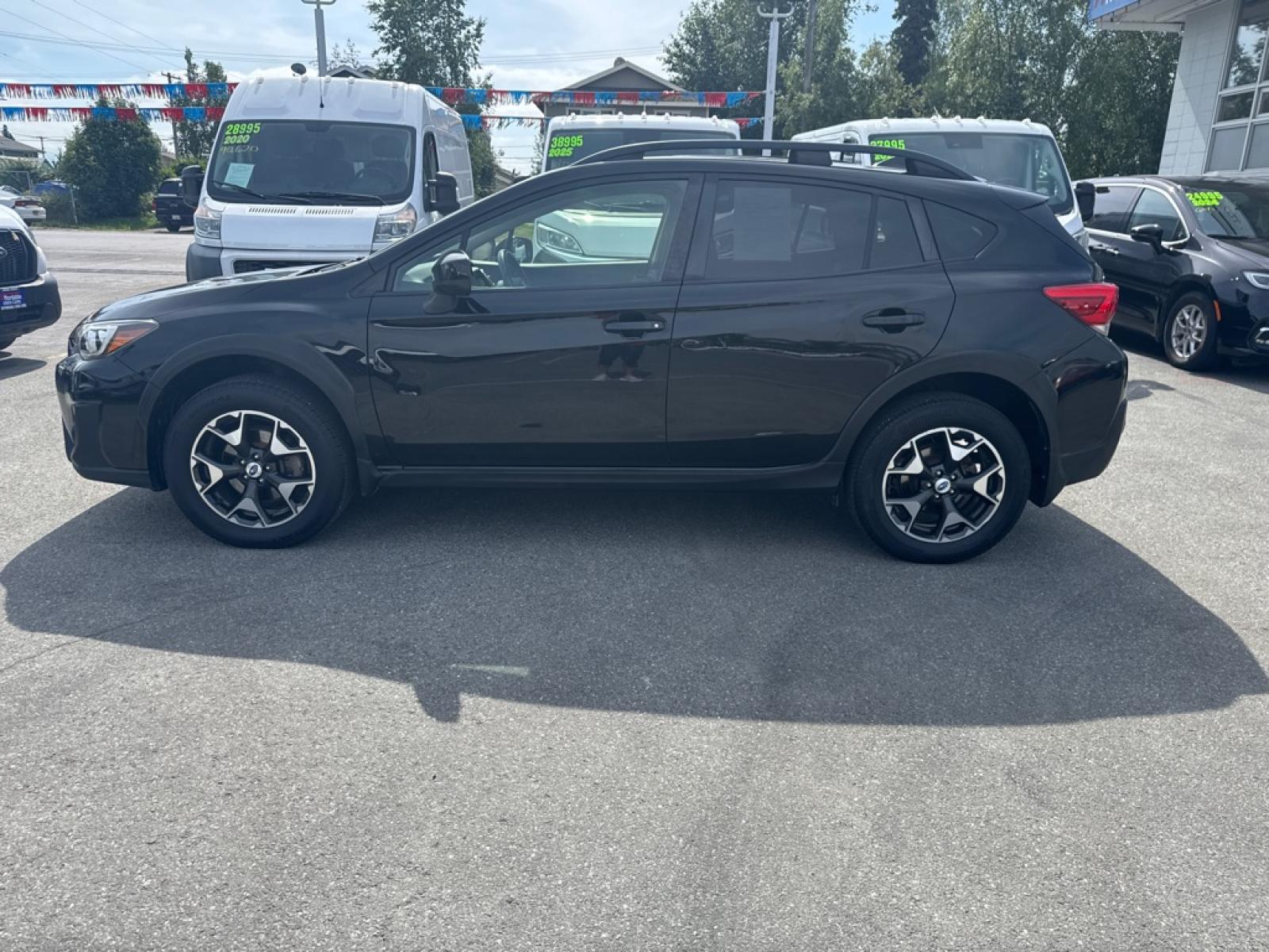 2018 BLACK SUBARU CROSSTREK PREMIUM (JF2GTABC9JH) with an 2.0L engine, 6-Speed Manual transmission, located at 929 East 8th Ave, Anchorage, AK, 99501, (907) 274-2277, 61.214783, -149.866074 - Photo#4