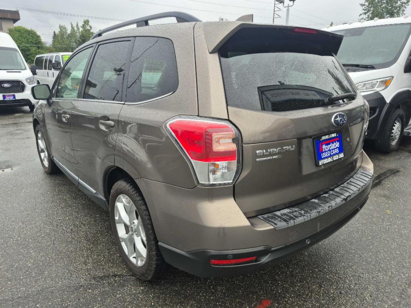 2017 BROWN SUBARU FORESTER 2.5I TOURING (JF2SJAWC7HH) with an 2.5L engine, Continuously Variable transmission, located at 929 East 8th Ave, Anchorage, AK, 99501, (907) 274-2277, 61.214783, -149.866074- Photo#2