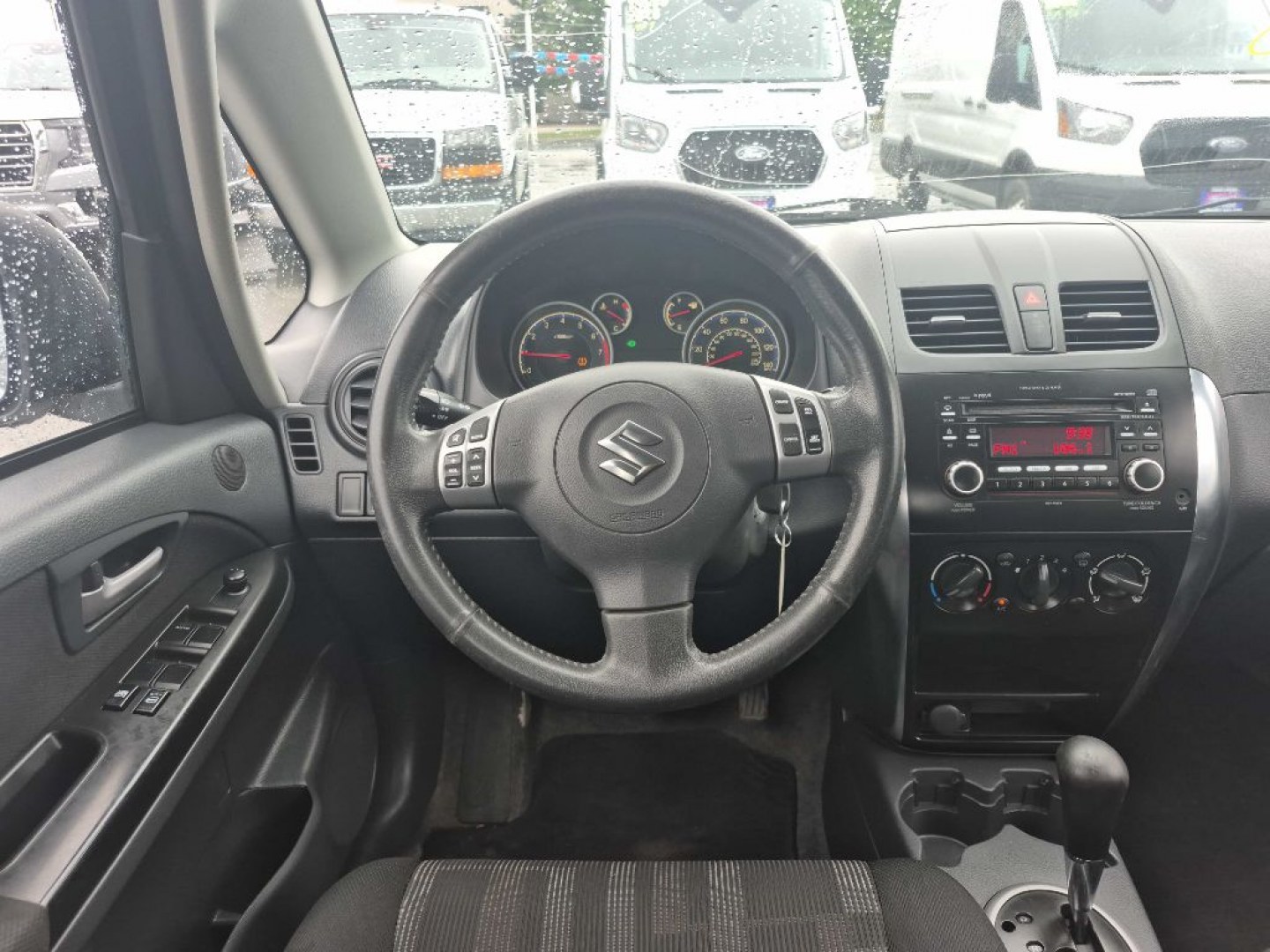 2012 SILVER SUZUKI SX4 LE (JS2YC5A33C6) with an 2.0L engine, 6-Speed Manual transmission, located at 929 East 8th Ave, Anchorage, AK, 99501, (907) 274-2277, 61.214783, -149.866074- Photo#4
