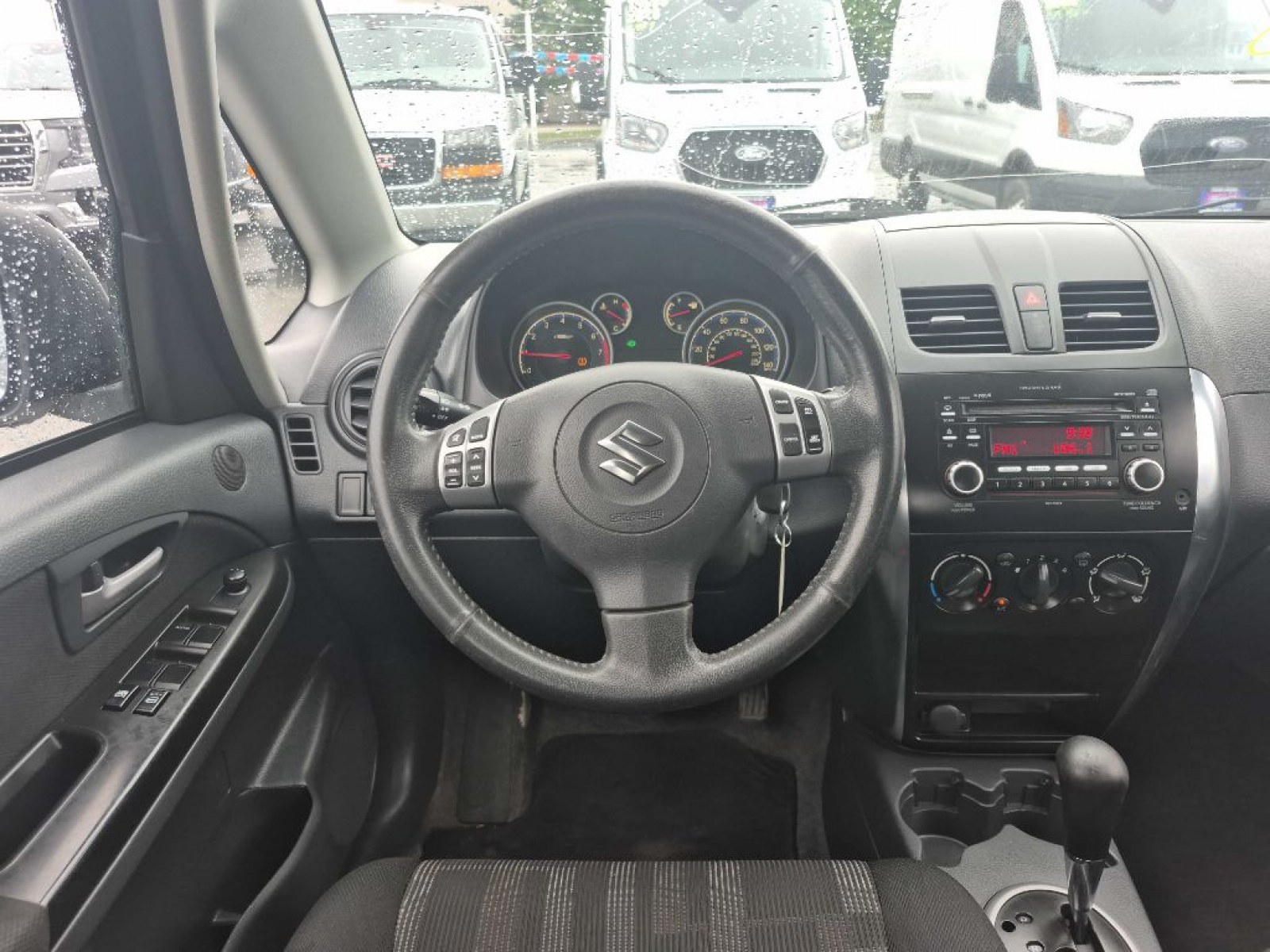 2012 SILVER SUZUKI SX4 LE (JS2YC5A33C6) with an 2.0L engine, 6-Speed Manual transmission, located at 929 East 8th Ave, Anchorage, AK, 99501, (907) 274-2277, 61.214783, -149.866074 - Photo#4