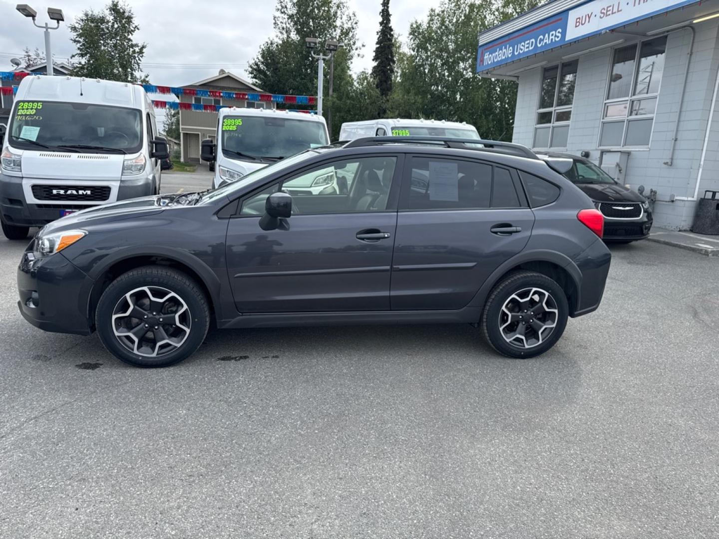 2014 BLACK SUBARU XV CROSSTREK 2.0 LIMITED (JF2GPAKC3E8) with an 2.0L engine, Continuously Variable transmission, located at 929 East 8th Ave, Anchorage, AK, 99501, (907) 274-2277, 61.214783, -149.866074- Photo#1