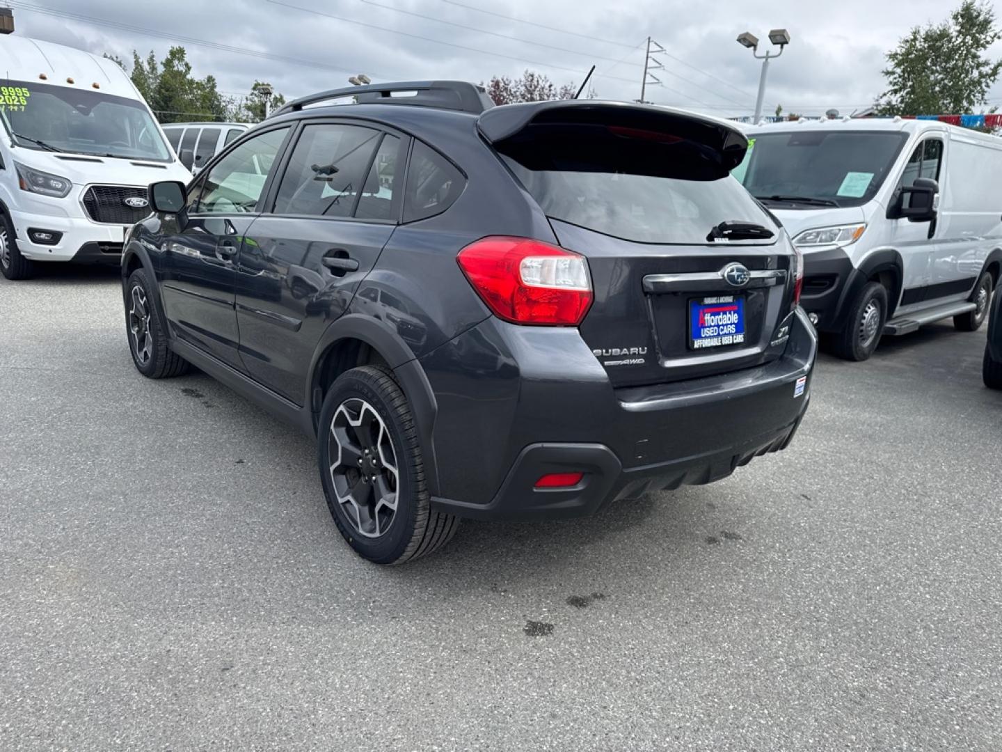 2014 BLACK SUBARU XV CROSSTREK 2.0 LIMITED (JF2GPAKC3E8) with an 2.0L engine, Continuously Variable transmission, located at 929 East 8th Ave, Anchorage, AK, 99501, (907) 274-2277, 61.214783, -149.866074- Photo#3