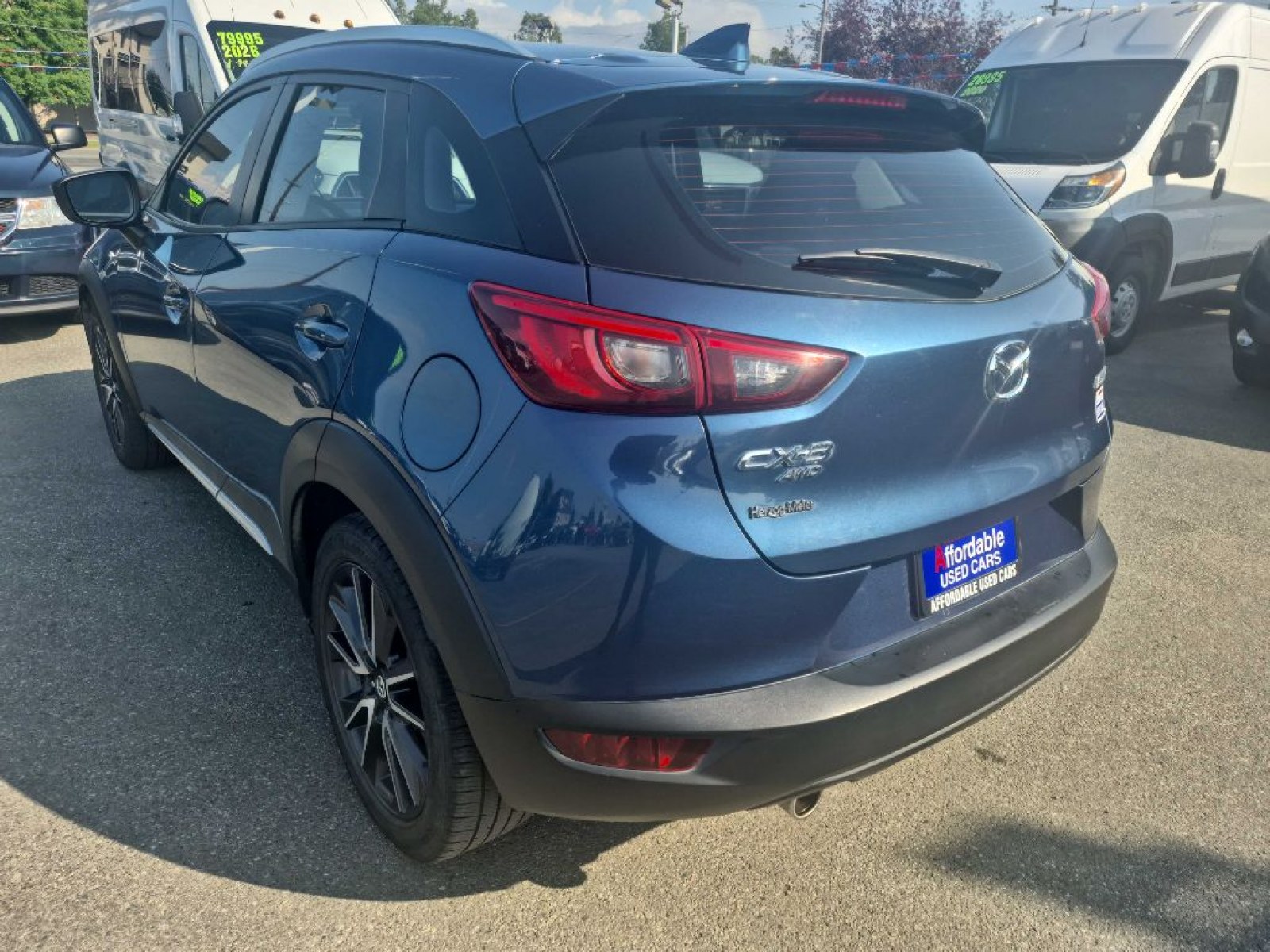 2018 BLUE MAZDA CX-3 GRAND TOURING (JM1DKFD76J0) with an 2.0L engine, Automatic transmission, located at 929 East 8th Ave, Anchorage, AK, 99501, (907) 274-2277, 61.214783, -149.866074 - Photo#2