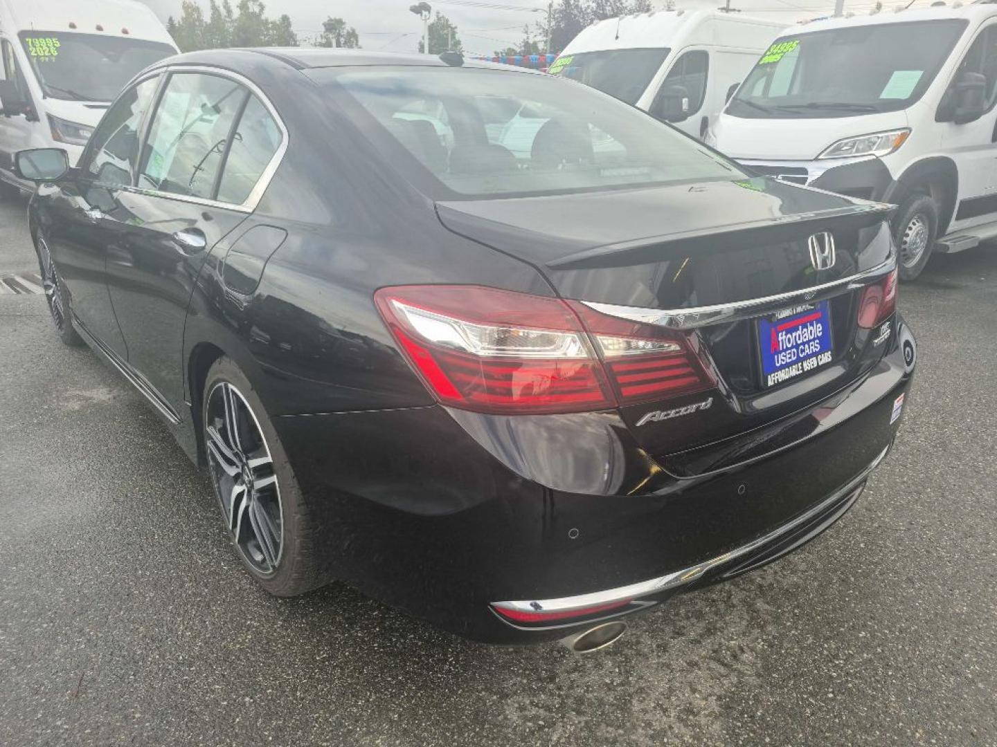 2017 BLACK HONDA ACCORD TOURING (1HGCR3F94HA) with an 3.5L engine, Automatic transmission, located at 929 East 8th Ave, Anchorage, AK, 99501, (907) 274-2277, 61.214783, -149.866074- Photo#2