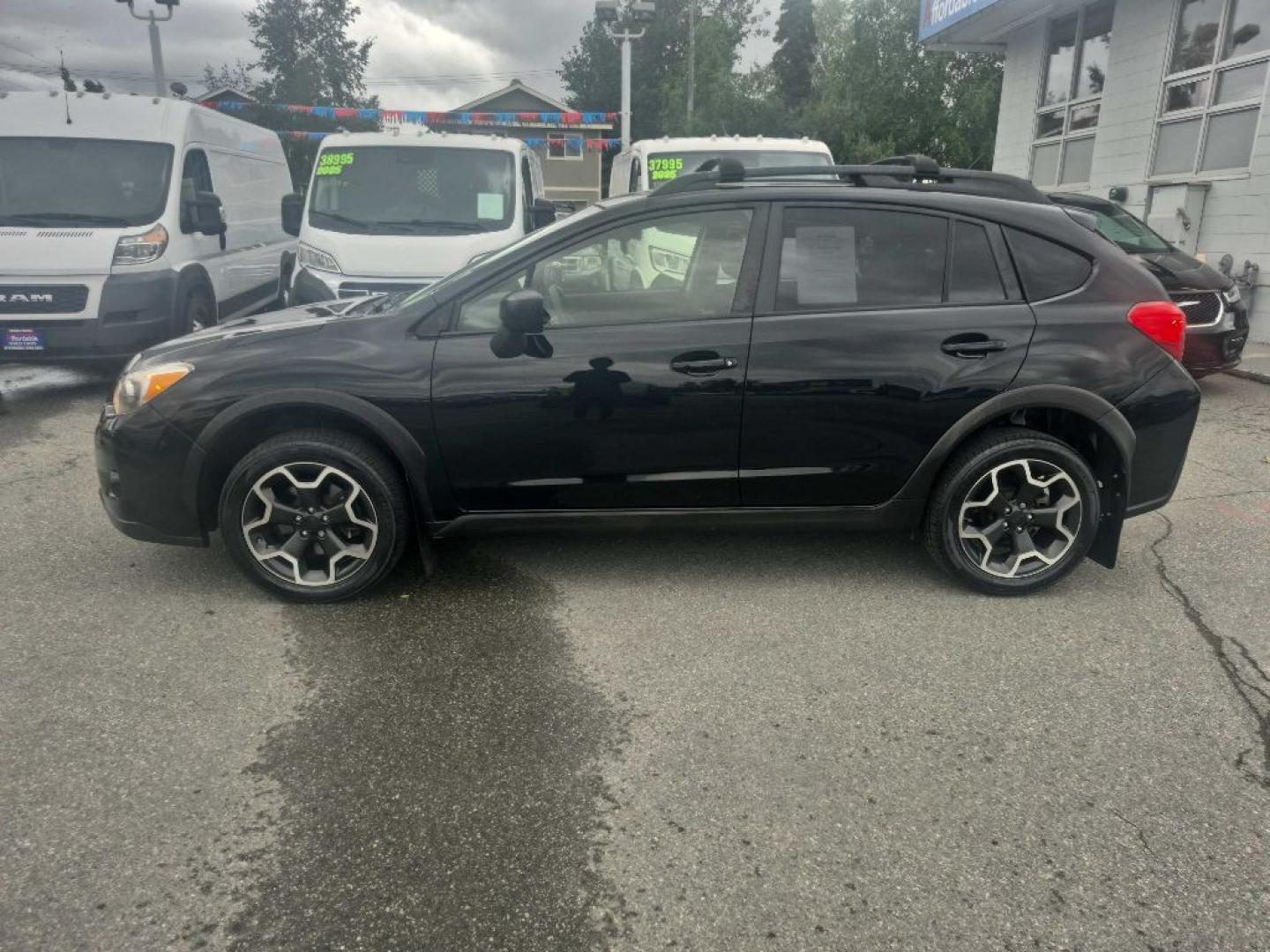 2015 BLACK SUBARU XV CROSSTREK (JF2GPAAC3F9) with an 2.0L engine, 5-Speed Manual transmission, located at 929 East 8th Ave, Anchorage, AK, 99501, (907) 274-2277, 61.214783, -149.866074- Photo#1