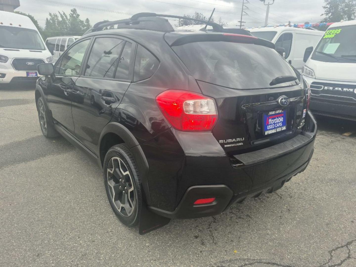 2015 BLACK SUBARU XV CROSSTREK (JF2GPAAC3F9) with an 2.0L engine, 5-Speed Manual transmission, located at 929 East 8th Ave, Anchorage, AK, 99501, (907) 274-2277, 61.214783, -149.866074- Photo#2