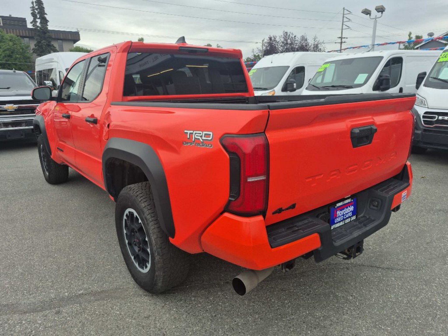 2024 ORANGE TOYOTA TACOMA DOUBLE CAB TRD OFF ROAD (3TYLB5JN7RT) with an 2.4L engine, Automatic transmission, located at 929 East 8th Ave, Anchorage, AK, 99501, (907) 274-2277, 61.214783, -149.866074- Photo#2