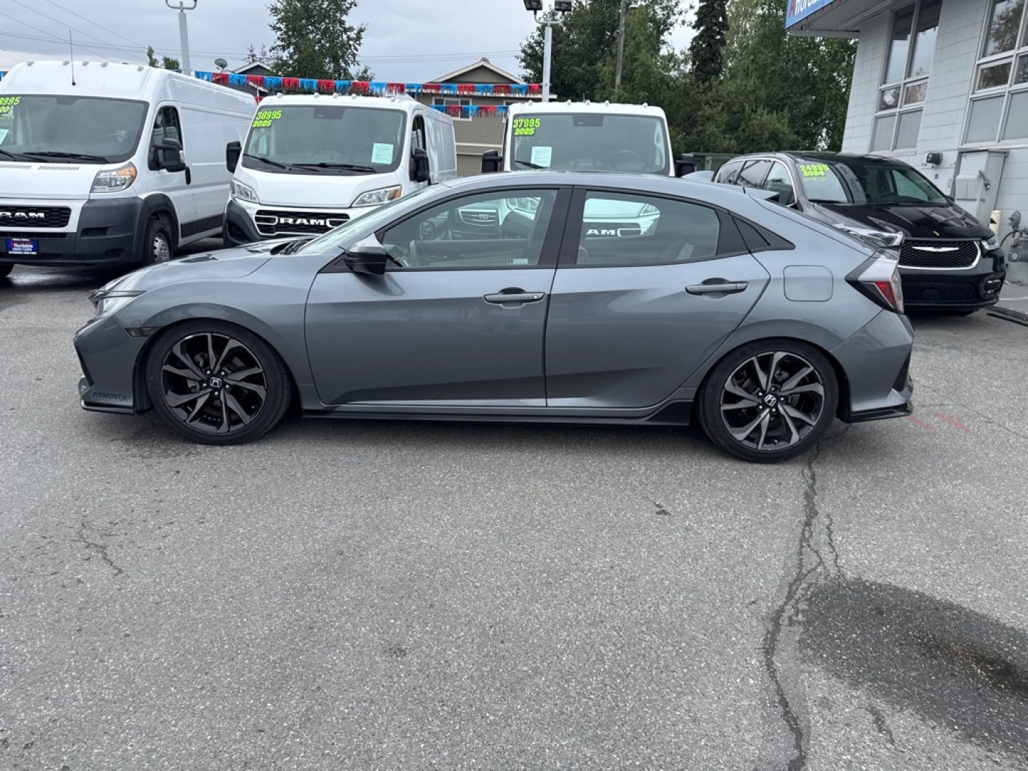 2018 GREY HONDA CIVIC SPORT (SHHFK7H4XJU) with an 1.5L engine, Continuously Variable transmission, located at 929 East 8th Ave, Anchorage, AK, 99501, (907) 274-2277, 61.214783, -149.866074- Photo#1
