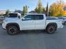 2023 WHITE NISSAN FRONTIER PRO-4X (1N6ED1EK3PN) with an 3.8L engine, Automatic transmission, located at 929 East 8th Ave, Anchorage, AK, 99501, (907) 274-2277, 61.214783, -149.866074- Photo#1