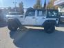 2012 SILVER JEEP WRANGLER UNLIMI SPORT (1C4BJWDG9CL) with an 3.6L engine, Automatic transmission, located at 929 East 8th Ave, Anchorage, AK, 99501, (907) 274-2277, 61.214783, -149.866074- Photo#1