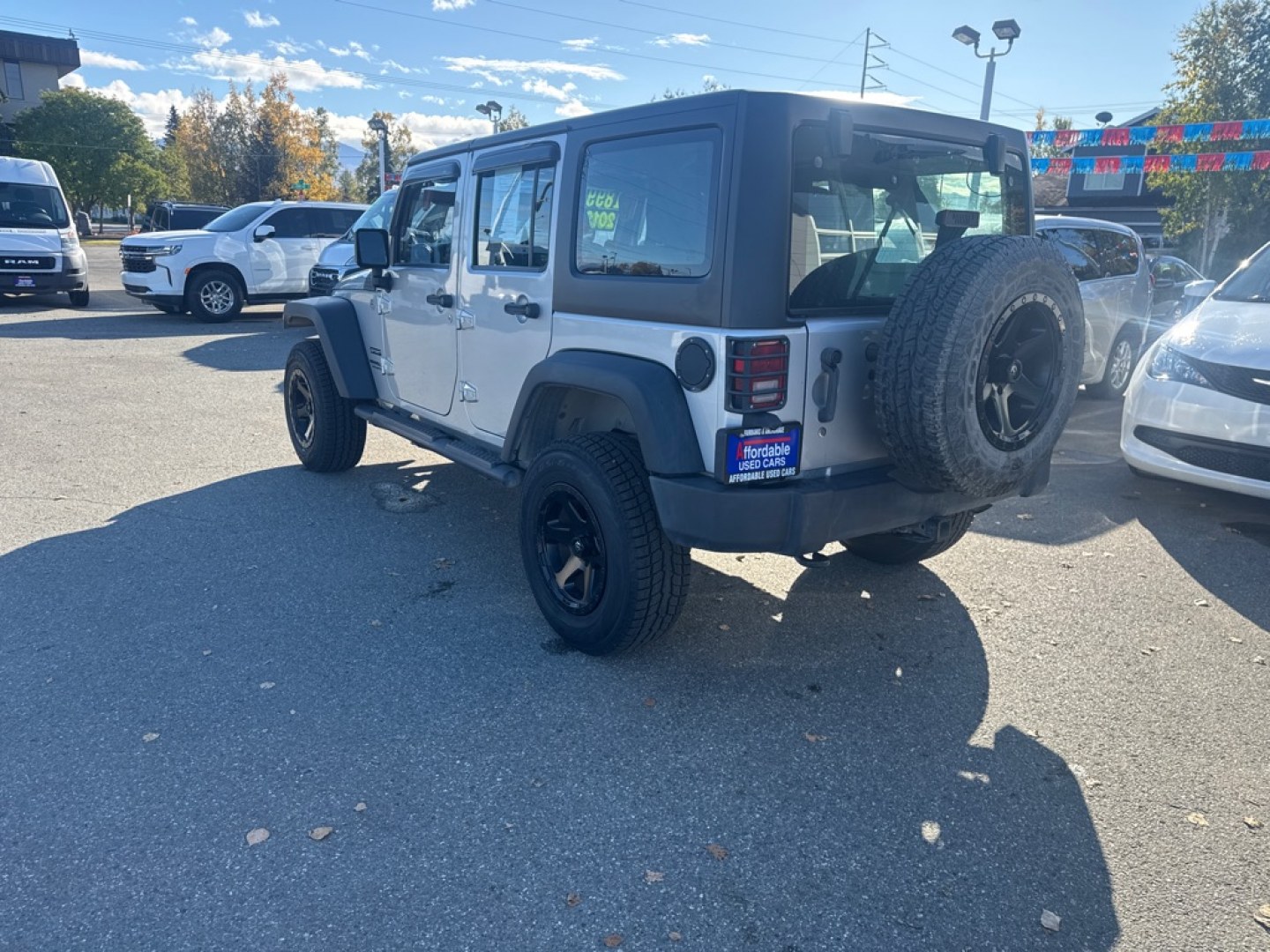 2012 SILVER JEEP WRANGLER UNLIMI SPORT (1C4BJWDG9CL) with an 3.6L engine, Automatic transmission, located at 929 East 8th Ave, Anchorage, AK, 99501, (907) 274-2277, 61.214783, -149.866074- Photo#4