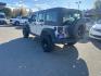 2012 SILVER JEEP WRANGLER UNLIMI SPORT (1C4BJWDG9CL) with an 3.6L engine, Automatic transmission, located at 929 East 8th Ave, Anchorage, AK, 99501, (907) 274-2277, 61.214783, -149.866074- Photo#4