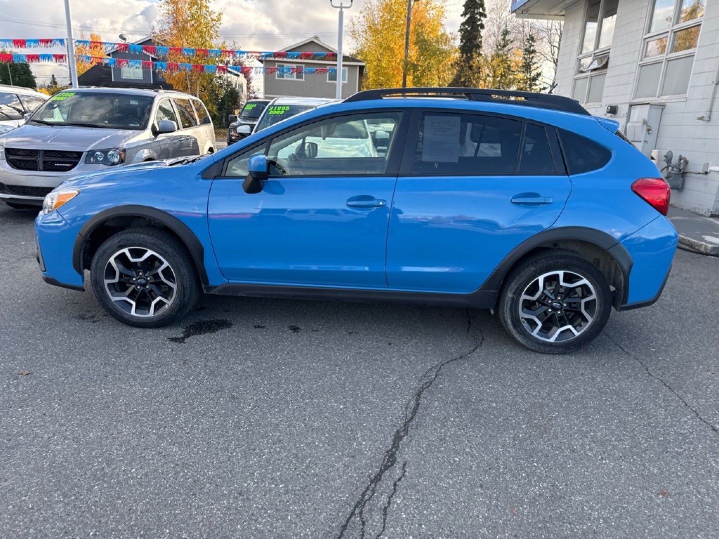 2016 BLUE SUBARU CROSSTREK PREMIUM (JF2GPABC4G8) with an 2.0L engine, 5-Speed Manual transmission, located at 929 East 8th Ave, Anchorage, AK, 99501, (907) 274-2277, 61.214783, -149.866074- Photo#1