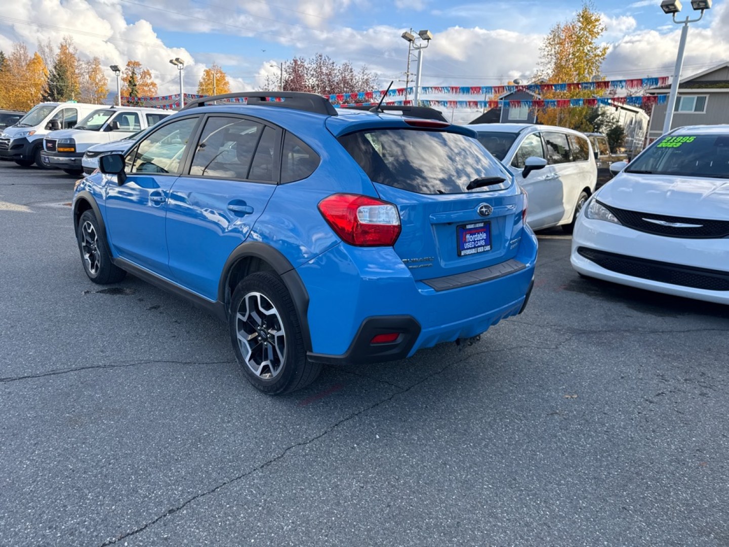 2016 BLUE SUBARU CROSSTREK PREMIUM (JF2GPABC4G8) with an 2.0L engine, 5-Speed Manual transmission, located at 929 East 8th Ave, Anchorage, AK, 99501, (907) 274-2277, 61.214783, -149.866074- Photo#4