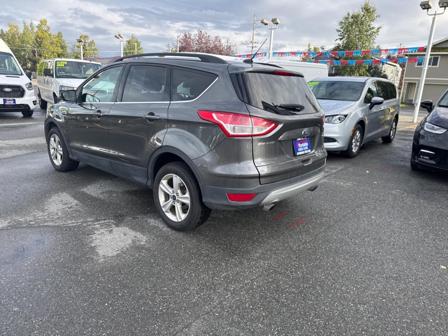 2016 GRAY FORD ESCAPE SE (1FMCU9GX8GU) with an 1.6L engine, Automatic transmission, located at 929 East 8th Ave, Anchorage, AK, 99501, (907) 274-2277, 61.214783, -149.866074- Photo#4
