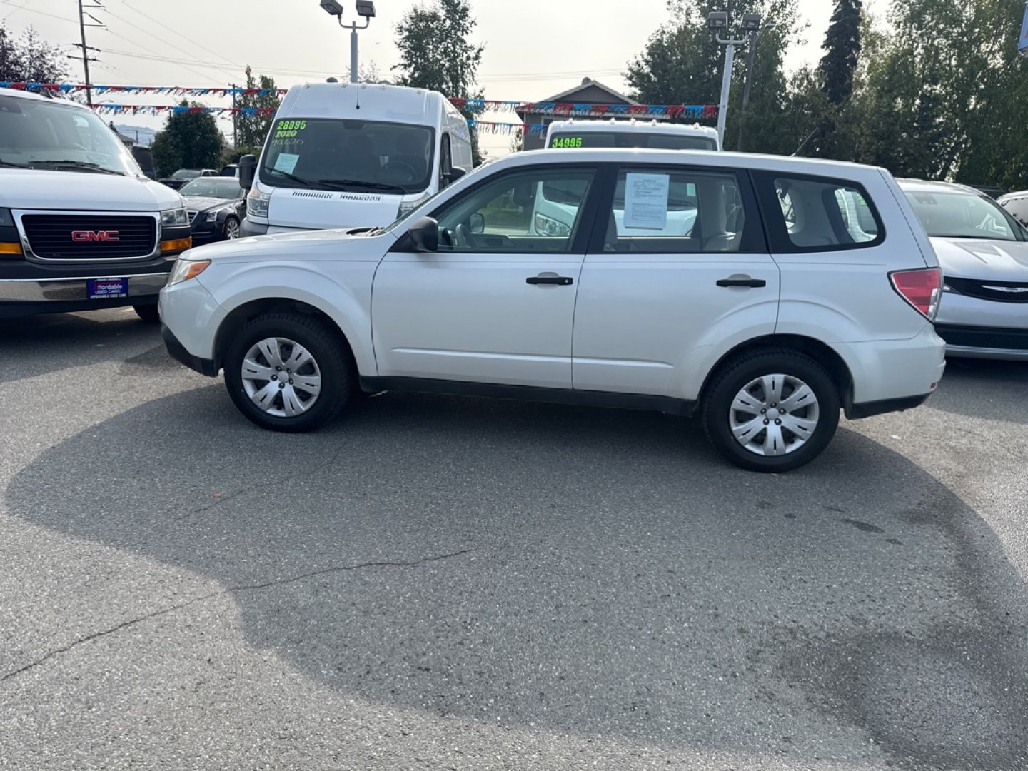 2009 WHITE SUBARU FORESTER 2.5X (JF2SH61679H) with an 2.5L engine, Automatic transmission, located at 929 East 8th Ave, Anchorage, AK, 99501, (907) 274-2277, 61.214783, -149.866074- Photo#1
