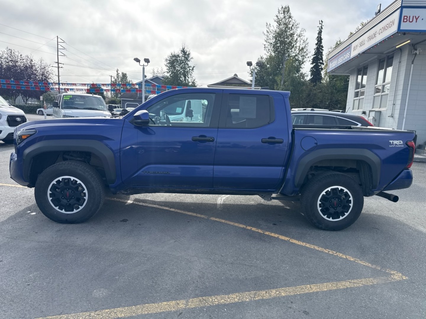2024 BLUE TOYOTA TACOMA TRD DOUBLE CAB (3TYLB5JN3RT) with an 2.4L engine, Automatic transmission, located at 929 East 8th Ave, Anchorage, AK, 99501, (907) 274-2277, 61.214783, -149.866074- Photo#1