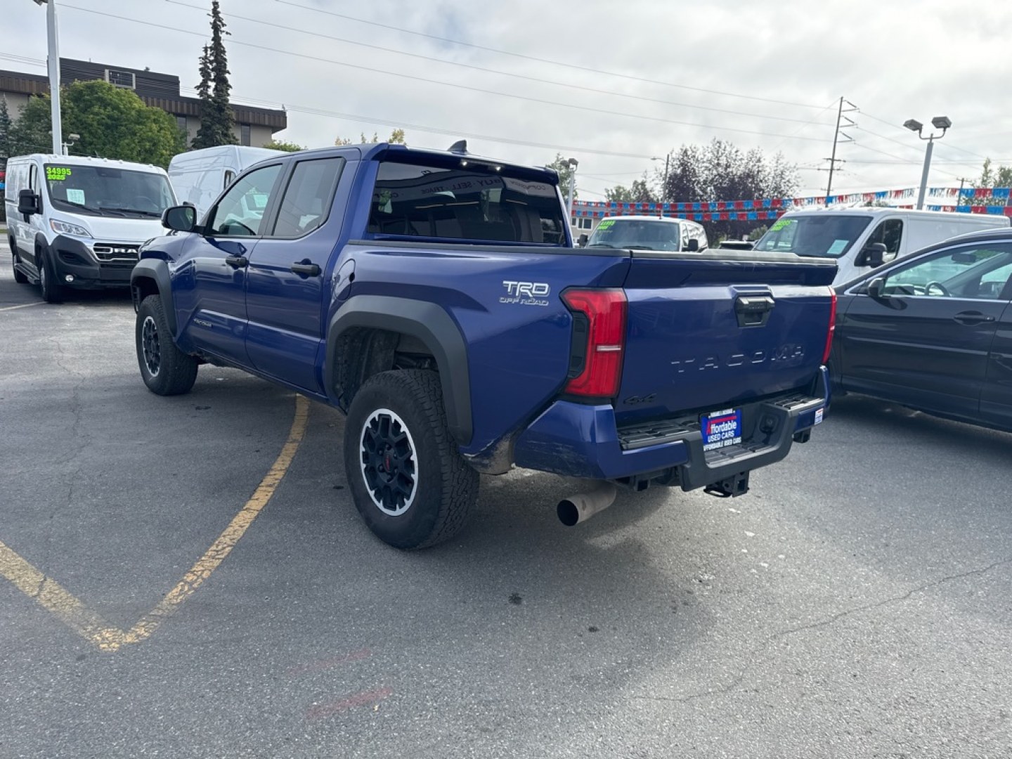 2024 BLUE TOYOTA TACOMA TRD DOUBLE CAB (3TYLB5JN3RT) with an 2.4L engine, Automatic transmission, located at 929 East 8th Ave, Anchorage, AK, 99501, (907) 274-2277, 61.214783, -149.866074- Photo#4