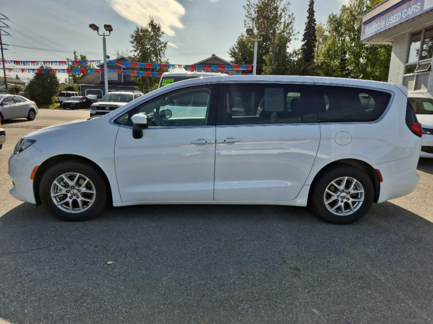 2023 WHITE CHRYSLER VOYAGER LX LX (2C4RC1CG7PR) with an 3.6L engine, Automatic transmission, located at 929 East 8th Ave, Anchorage, AK, 99501, (907) 274-2277, 61.214783, -149.866074- Photo#1