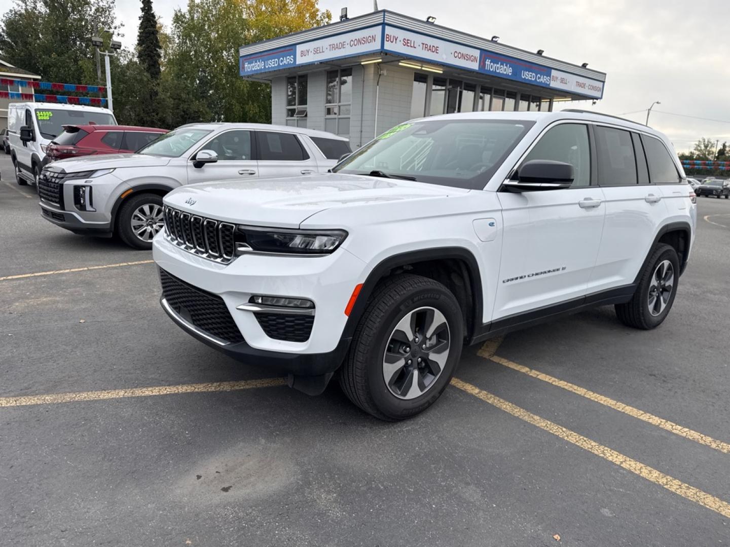 2023 WHITE JEEP GRAND CHEROKEE LIMITED 4XE (1C4RJYB66P8) with an 2.0L engine, Automatic transmission, located at 929 East 8th Ave, Anchorage, AK, 99501, (907) 274-2277, 61.214783, -149.866074- Photo#0