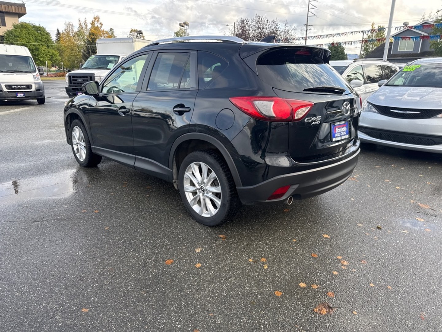 2014 BLACK MAZDA CX-5 GT (JM3KE4DY8E0) with an 2.5L engine, Automatic transmission, located at 929 East 8th Ave, Anchorage, AK, 99501, (907) 274-2277, 61.214783, -149.866074- Photo#3