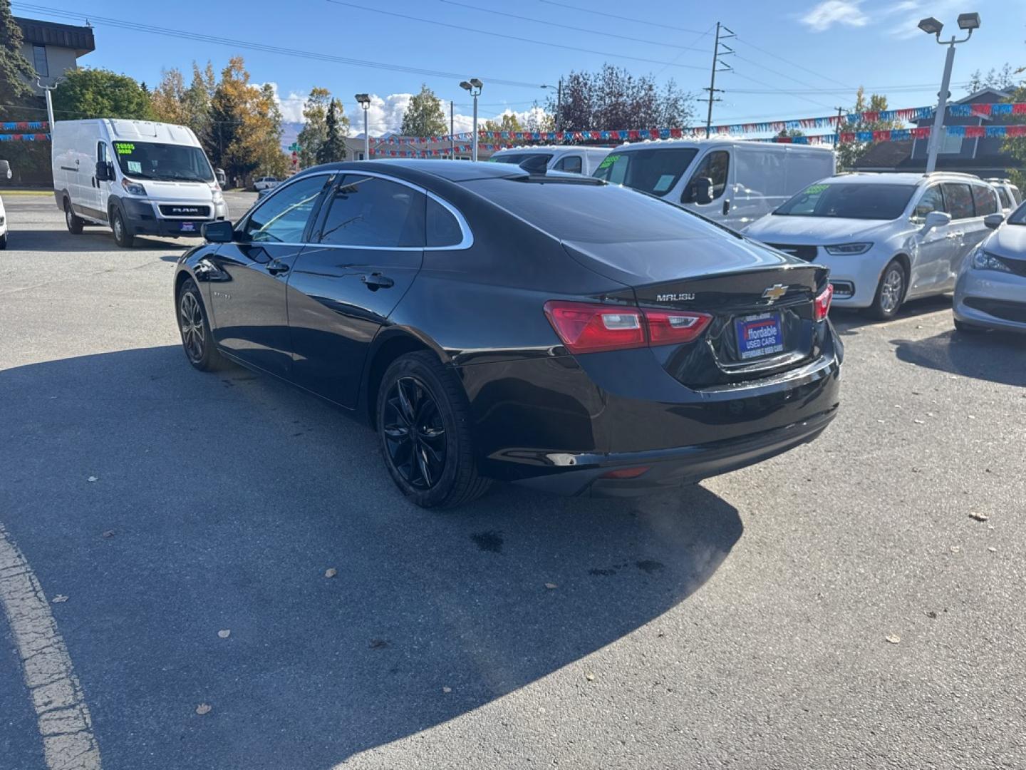 2024 BLACK CHEVROLET MALIBU LT (1G1ZD5ST7RF) with an 1.5L engine, Continuously Variable transmission, located at 929 East 8th Ave, Anchorage, AK, 99501, (907) 274-2277, 61.214783, -149.866074- Photo#4