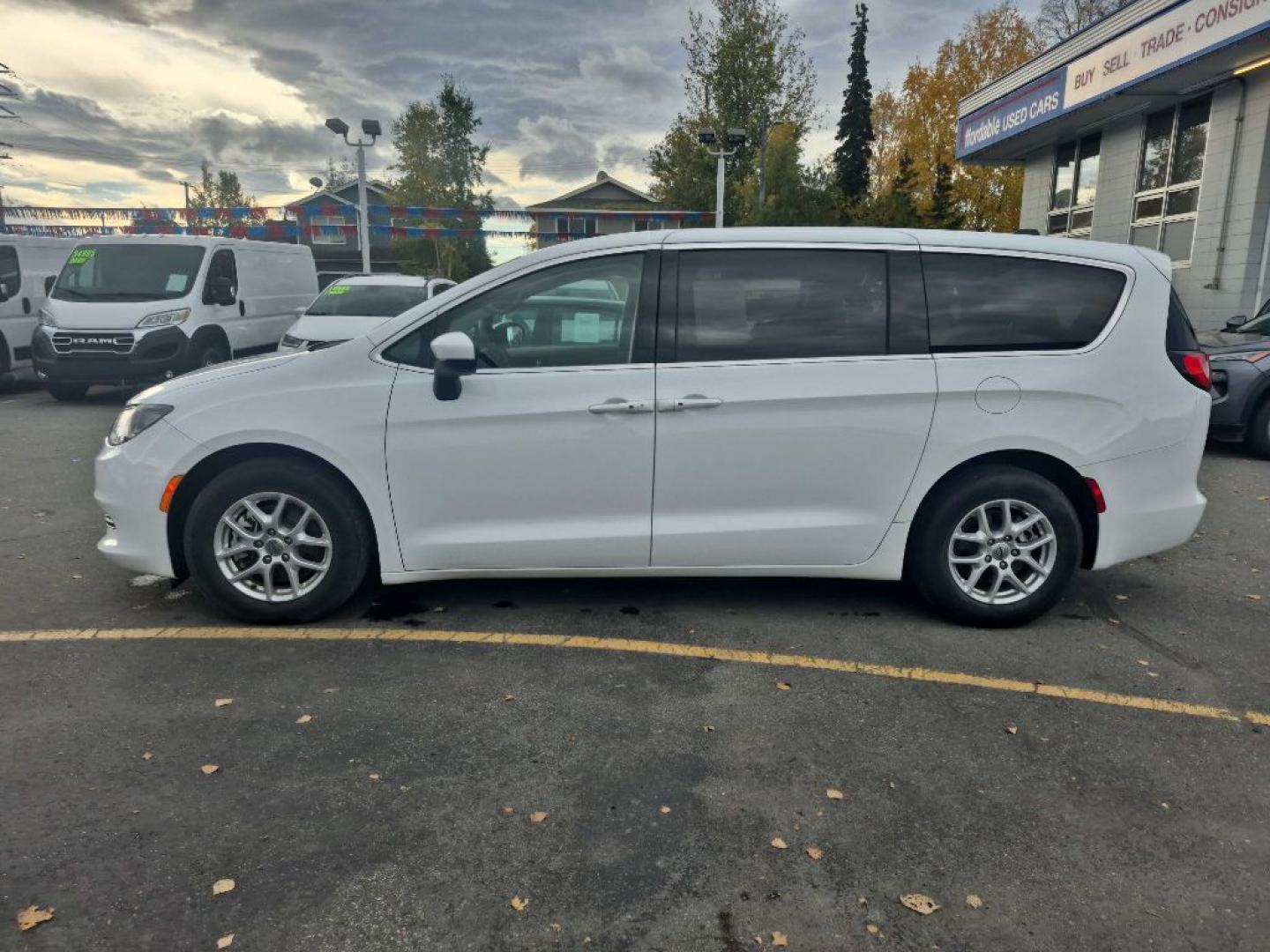 2023 WHITE CHRYSLER VOYAGER LX LX (2C4RC1CG9PR) with an 3.6L engine, Automatic transmission, located at 929 East 8th Ave, Anchorage, AK, 99501, (907) 274-2277, 61.214783, -149.866074- Photo#1