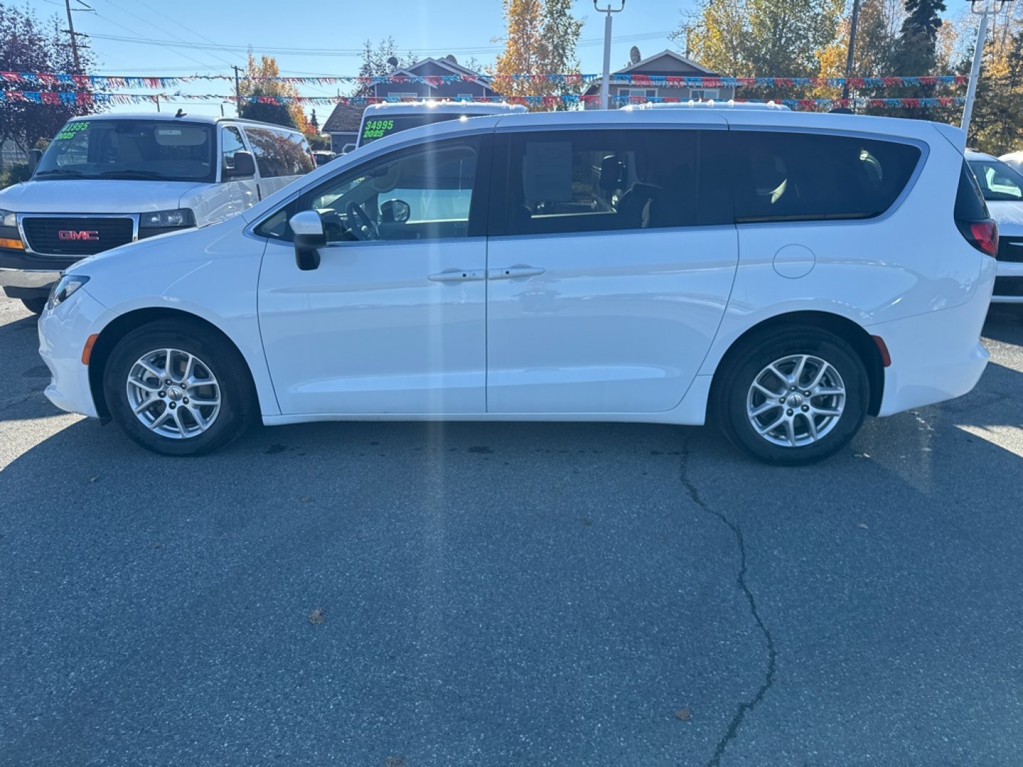 2023 WHITE CHRYSLER VOYAGER LX LX (2C4RC1CG7PR) with an 3.6L engine, Automatic transmission, located at 929 East 8th Ave, Anchorage, AK, 99501, (907) 274-2277, 61.214783, -149.866074- Photo#1