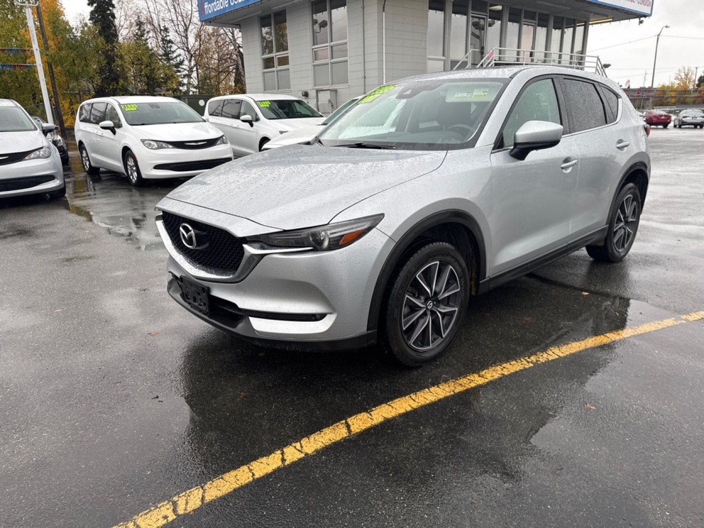 2017 SILVER MAZDA CX-5 GRAND TOURING (JM3KFBDL3H0) with an 2.5L engine, Automatic transmission, located at 929 East 8th Ave, Anchorage, AK, 99501, (907) 274-2277, 61.214783, -149.866074- Photo#0