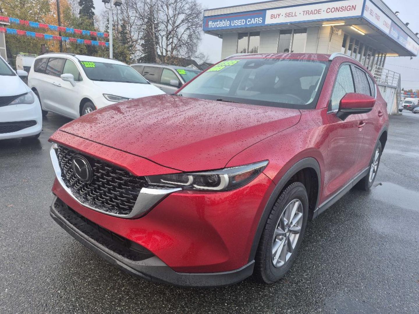 2023 RED MAZDA CX-5 SELECT (JM3KFBBM1P0) with an 2.5L engine, Automatic transmission, located at 929 East 8th Ave, Anchorage, AK, 99501, (907) 274-2277, 61.214783, -149.866074- Photo#0
