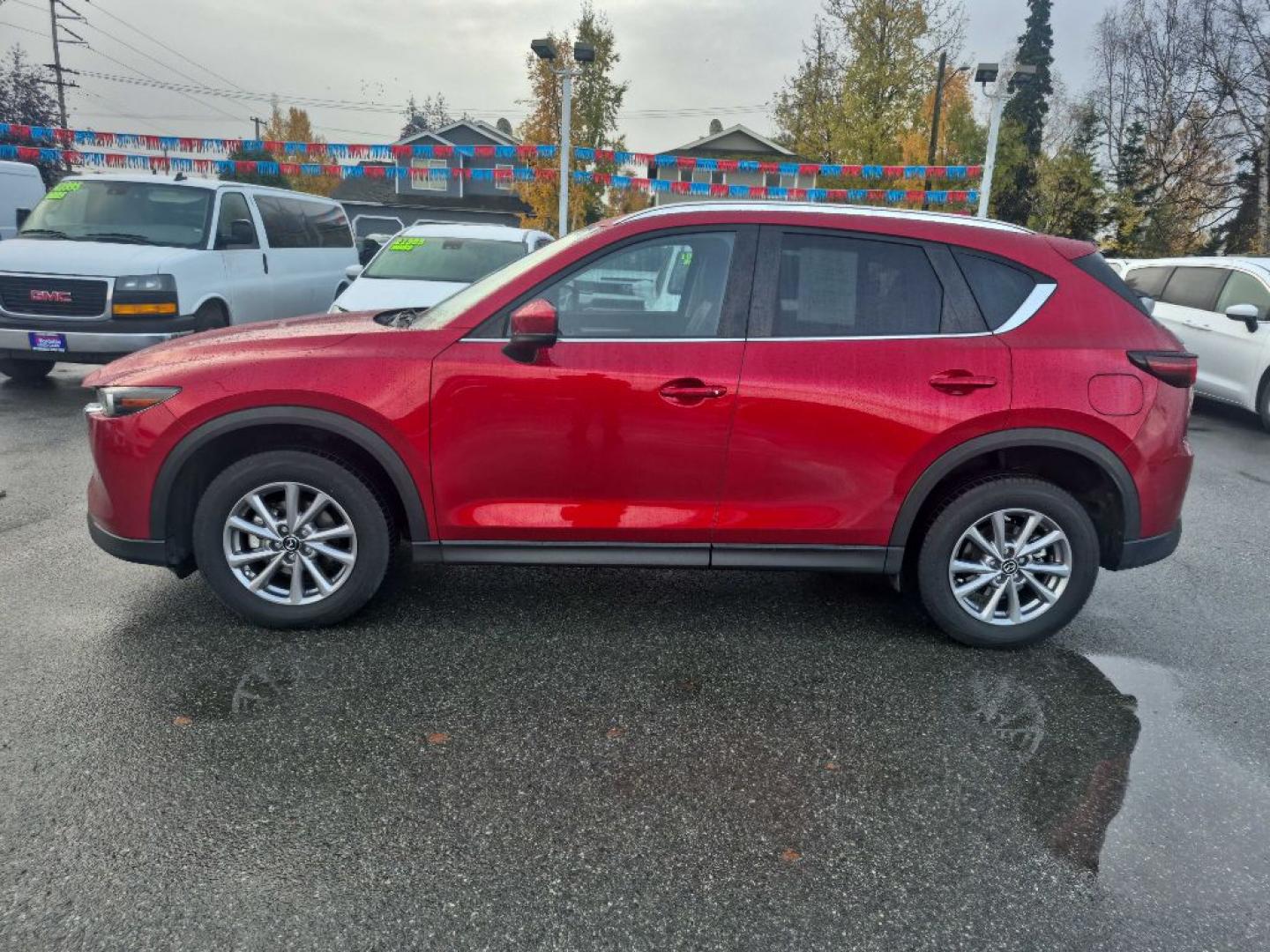 2023 RED MAZDA CX-5 SELECT (JM3KFBBM1P0) with an 2.5L engine, Automatic transmission, located at 929 East 8th Ave, Anchorage, AK, 99501, (907) 274-2277, 61.214783, -149.866074- Photo#1