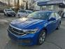 2024 BLUE VOLKSWAGEN JETTA SE SE (3VWEM7BU0RM) with an 1.5L engine, Automatic transmission, located at 929 East 8th Ave, Anchorage, AK, 99501, (907) 274-2277, 61.214783, -149.866074- Photo#0