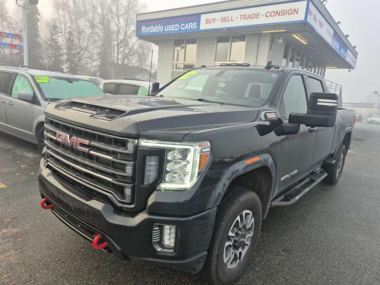 2023 BLACK GMC SIERRA 2500 AT4 (1GT49PEY9PF) with an 6.6L engine, Automatic transmission, located at 929 East 8th Ave, Anchorage, AK, 99501, (907) 274-2277, 61.214783, -149.866074- Photo#0
