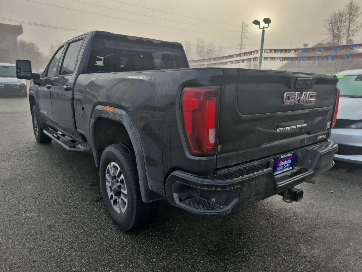2023 BLACK GMC SIERRA 2500 AT4 (1GT49PEY9PF) with an 6.6L engine, Automatic transmission, located at 929 East 8th Ave, Anchorage, AK, 99501, (907) 274-2277, 61.214783, -149.866074- Photo#2